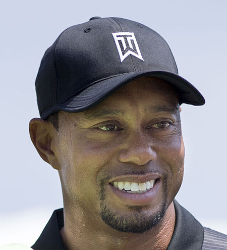 450px-Tiger_Woods_with_a_fan_2014_cr
